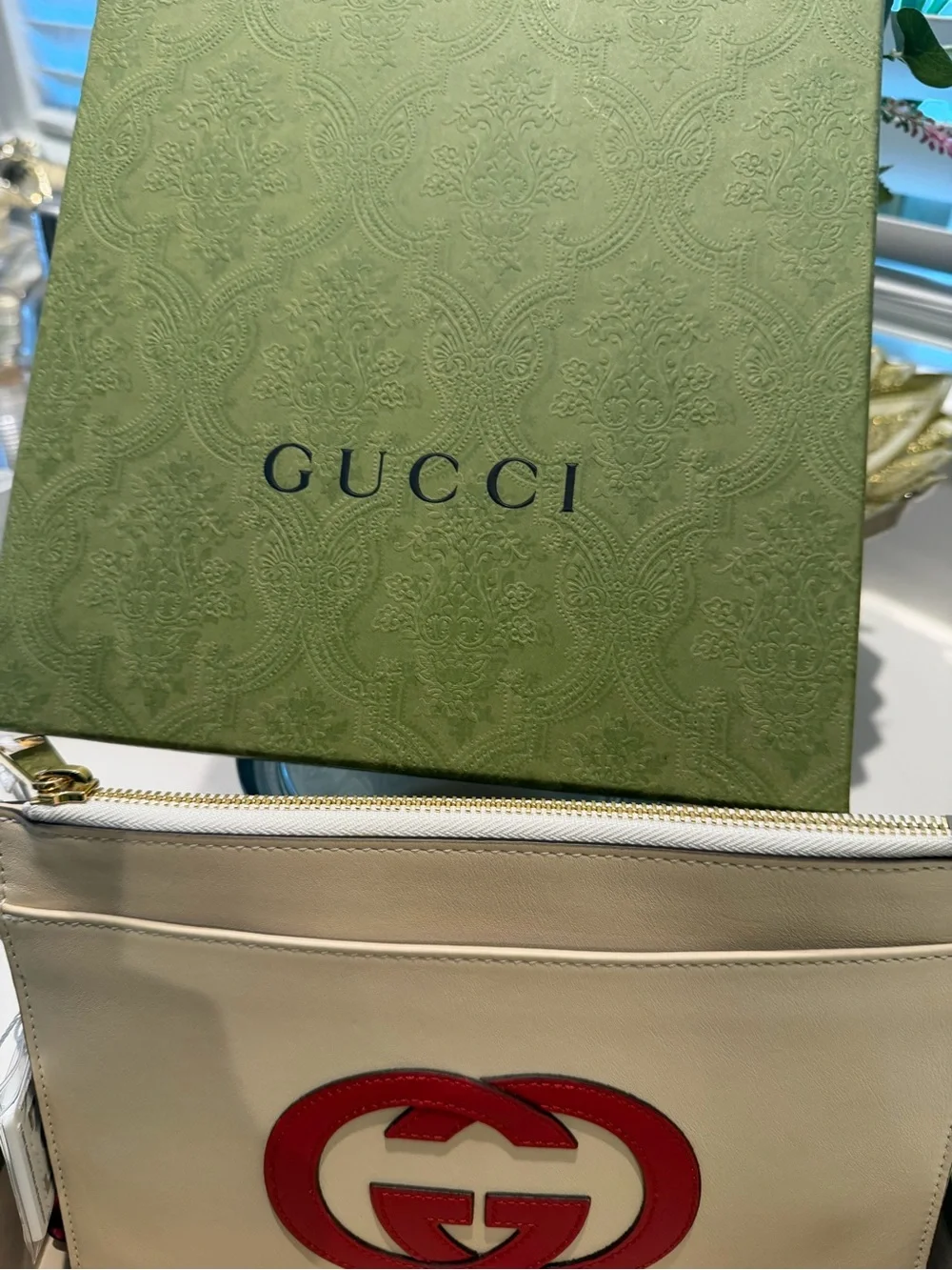 Authentic Gucci Cream Leather Zip Pouch with Red Double G Logo
